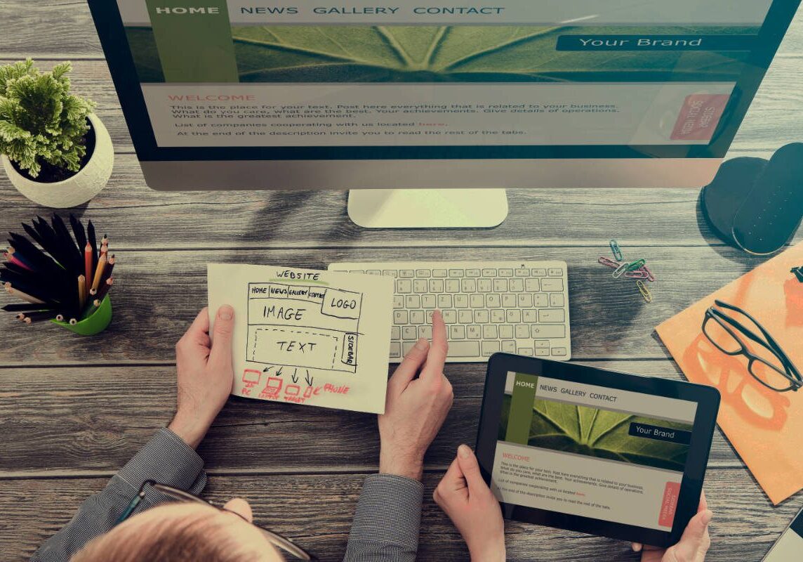 Planning a website: a hand-drawn wireframe next to a desktop and tablet showing the finished design